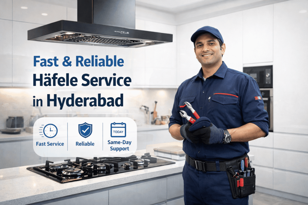 Same-day Häfele repair service in Hyderabad technician fixing kitchen chimney in modern Indian kitchen