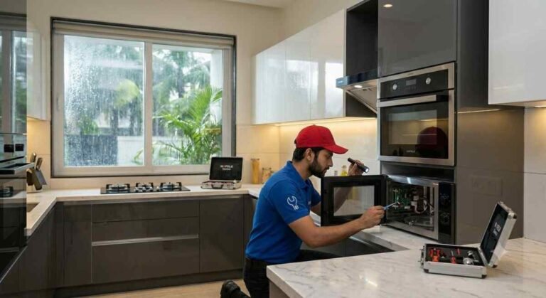 Technician inspecting Hafele microwave oven to prevent moisture-related issues.